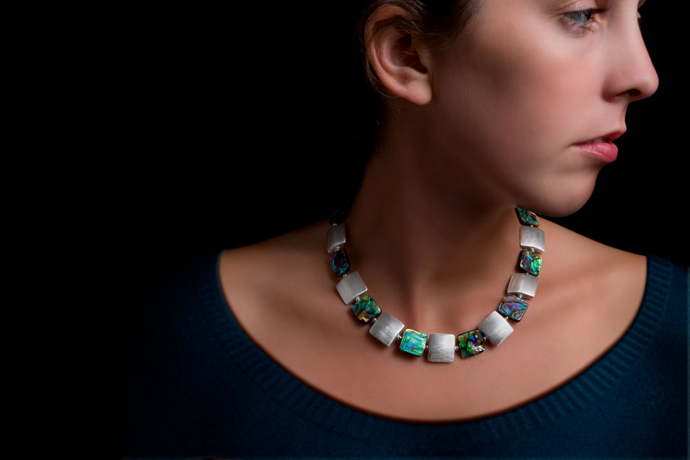 photo retouching of a jewelry model before and after image